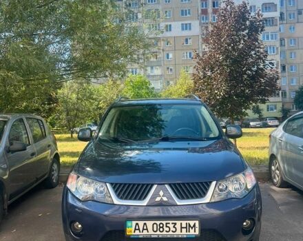 Синий Мицубиси Аутлендер, объемом двигателя 2.36 л и пробегом 182 тыс. км за 9300 $, фото 1 на Automoto.ua