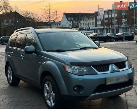 Синій Міцубісі Аутлендер, об'ємом двигуна 2.4 л та пробігом 207 тис. км за 7800 $, фото 1 на Automoto.ua