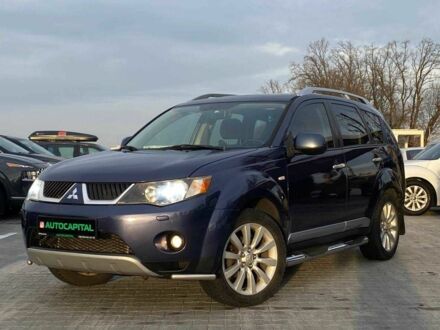 Синий Мицубиси Аутлендер, объемом двигателя 2.4 л и пробегом 282 тыс. км за 9490 $, фото 1 на Automoto.ua