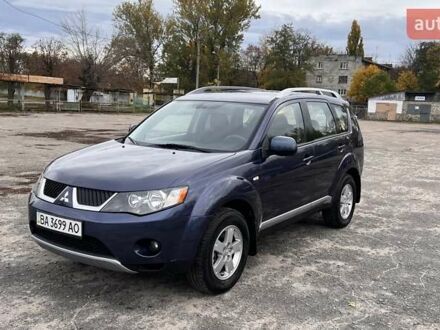 Синий Мицубиси Аутлендер, объемом двигателя 2.4 л и пробегом 94 тыс. км за 8800 $, фото 1 на Automoto.ua