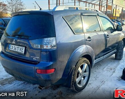 Синий Мицубиси Аутлендер, объемом двигателя 2.4 л и пробегом 16200 тыс. км за 8800 $, фото 1 на Automoto.ua