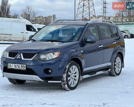 Синий Мицубиси Аутлендер, объемом двигателя 2.36 л и пробегом 283 тыс. км за 10500 $, фото 1 на Automoto.ua