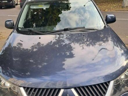 Синий Мицубиси Аутлендер, объемом двигателя 2.4 л и пробегом 160 тыс. км за 8800 $, фото 1 на Automoto.ua