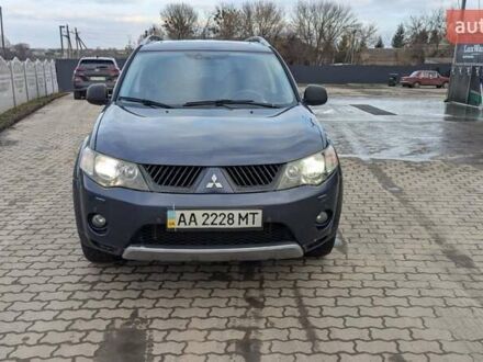 Синий Мицубиси Аутлендер, объемом двигателя 3 л и пробегом 382 тыс. км за 8200 $, фото 1 на Automoto.ua