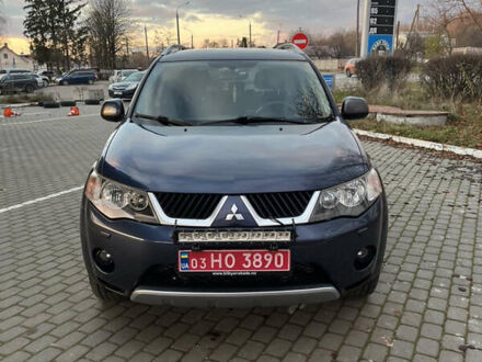 Синий Мицубиси Аутлендер, объемом двигателя 2 л и пробегом 263 тыс. км за 8900 $, фото 1 на Automoto.ua