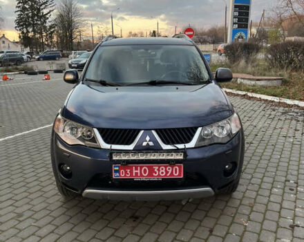 Синий Мицубиси Аутлендер, объемом двигателя 2 л и пробегом 263 тыс. км за 8900 $, фото 1 на Automoto.ua