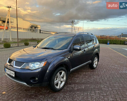 Синій Міцубісі Аутлендер, об'ємом двигуна 2.4 л та пробігом 246 тис. км за 7950 $, фото 1 на Automoto.ua
