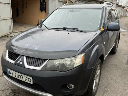 Синий Мицубиси Аутлендер, объемом двигателя 2.36 л и пробегом 269 тыс. км за 7500 $, фото 1 на Automoto.ua