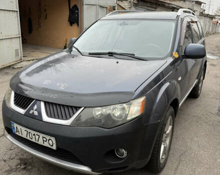 Синий Мицубиси Аутлендер, объемом двигателя 2.36 л и пробегом 269 тыс. км за 7500 $, фото 1 на Automoto.ua