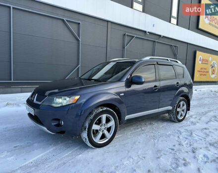 Синий Мицубиси Аутлендер, объемом двигателя 2.36 л и пробегом 269 тыс. км за 8700 $, фото 1 на Automoto.ua