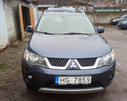 Синий Мицубиси Аутлендер, объемом двигателя 2 л и пробегом 306 тыс. км за 5200 $, фото 1 на Automoto.ua