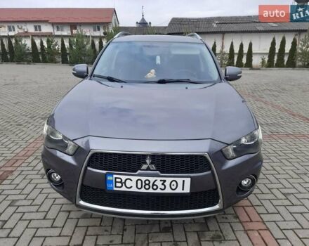 Синій Міцубісі Аутлендер, об'ємом двигуна 2 л та пробігом 200 тис. км за 10500 $, фото 1 на Automoto.ua