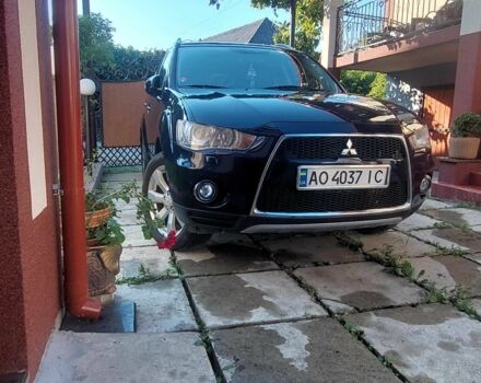 Синий Мицубиси Аутлендер, объемом двигателя 2.2 л и пробегом 295 тыс. км за 10900 $, фото 1 на Automoto.ua