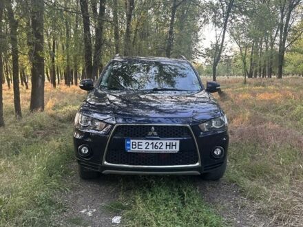 Мицубиси Аутлендер 2010 в Вознесенске на Automoto.ua Синий Мицубиси Аутлендер, объемом двигателя 2.3 л и пробегом 248 тыс. км за 11500 $, фото 1 на Automoto.ua