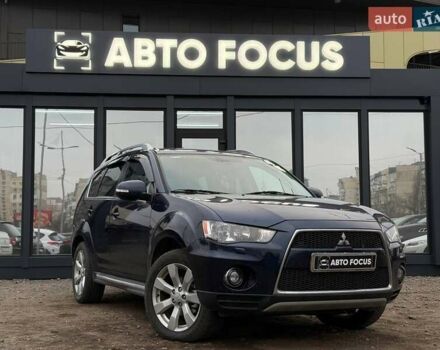 Синий Мицубиси Аутлендер, объемом двигателя 2.18 л и пробегом 289 тыс. км за 9990 $, фото 1 на Automoto.ua