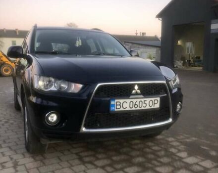 Синий Мицубиси Аутлендер, объемом двигателя 2 л и пробегом 235 тыс. км за 8800 $, фото 1 на Automoto.ua