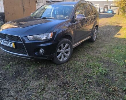 Синий Мицубиси Аутлендер, объемом двигателя 2.2 л и пробегом 284 тыс. км за 5700 $, фото 1 на Automoto.ua