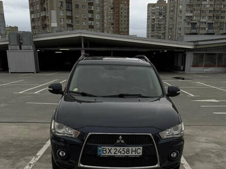 Синий Мицубиси Аутлендер, объемом двигателя 2.2 л и пробегом 213 тыс. км за 12000 $, фото 1 на Automoto.ua