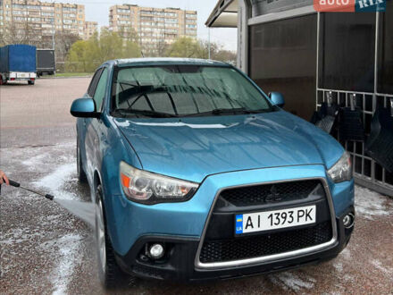 Мицубиси Аутлендер 2011 в Киеве на Automoto.ua Синий Мицубиси Аутлендер, объемом двигателя 2 л и пробегом 220 тыс. км за 9400 $, фото 1 на Automoto.ua