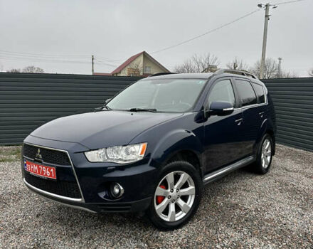 Синий Мицубиси Аутлендер, объемом двигателя 2.3 л и пробегом 202 тыс. км за 11650 $, фото 1 на Automoto.ua