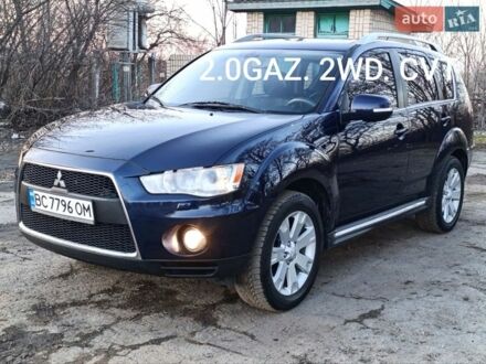 Синий Мицубиси Аутлендер, объемом двигателя 2 л и пробегом 290 тыс. км за 9500 $, фото 1 на Automoto.ua