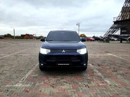 Синий Мицубиси Аутлендер, объемом двигателя 2 л и пробегом 314 тыс. км за 10999 $, фото 1 на Automoto.ua