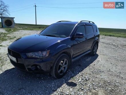 Синий Мицубиси Аутлендер, объемом двигателя 2.2 л и пробегом 270 тыс. км за 12300 $, фото 1 на Automoto.ua