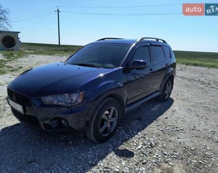 Синій Міцубісі Аутлендер, об'ємом двигуна 2.2 л та пробігом 270 тис. км за 12300 $, фото 1 на Automoto.ua