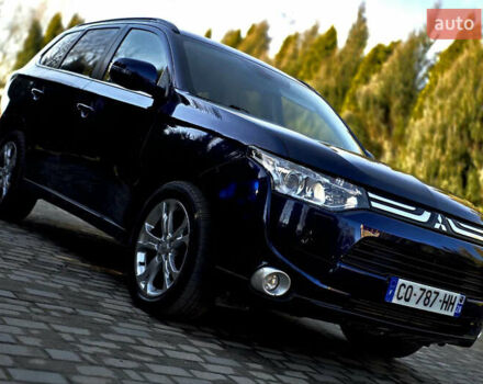 Синий Мицубиси Аутлендер, объемом двигателя 2.2 л и пробегом 164 тыс. км за 13900 $, фото 1 на Automoto.ua