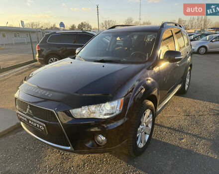 Синій Міцубісі Аутлендер, об'ємом двигуна 2.2 л та пробігом 192 тис. км за 13490 $, фото 1 на Automoto.ua