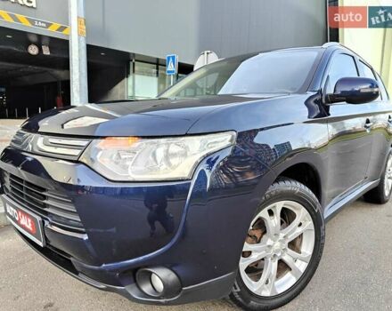 Синій Міцубісі Аутлендер, об'ємом двигуна 2.4 л та пробігом 213 тис. км за 10990 $, фото 1 на Automoto.ua