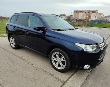 Синий Мицубиси Аутлендер, объемом двигателя 2 л и пробегом 154 тыс. км за 11700 $, фото 1 на Automoto.ua