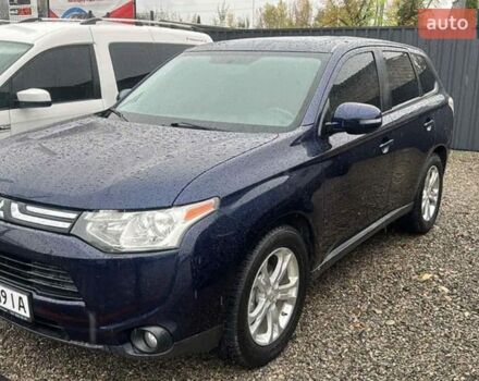 Синий Мицубиси Аутлендер, объемом двигателя 2.4 л и пробегом 312 тыс. км за 12000 $, фото 1 на Automoto.ua