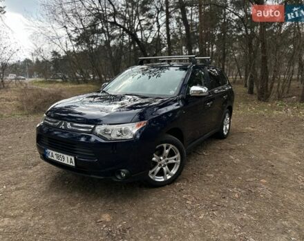 Синий Мицубиси Аутлендер, объемом двигателя 3 л и пробегом 125 тыс. км за 12900 $, фото 1 на Automoto.ua