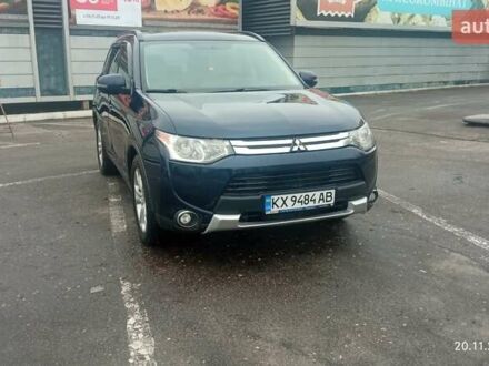 Синий Мицубиси Аутлендер, объемом двигателя 2.4 л и пробегом 230 тыс. км за 11300 $, фото 1 на Automoto.ua
