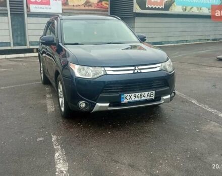 Синий Мицубиси Аутлендер, объемом двигателя 2.4 л и пробегом 230 тыс. км за 11300 $, фото 1 на Automoto.ua