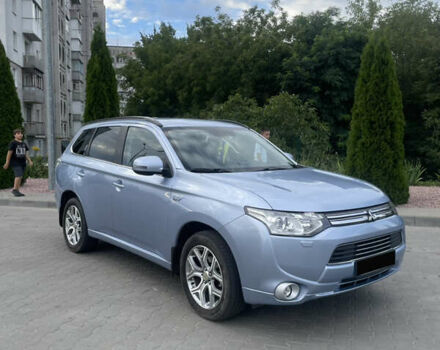 Синий Мицубиси Аутлендер, объемом двигателя 2 л и пробегом 155 тыс. км за 14999 $, фото 1 на Automoto.ua