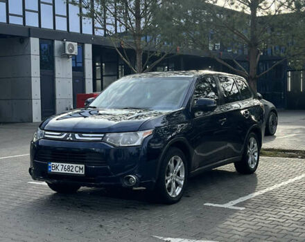 Синий Мицубиси Аутлендер, объемом двигателя 2.36 л и пробегом 187 тыс. км за 9999 $, фото 1 на Automoto.ua