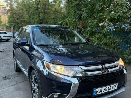 Синій Міцубісі Аутлендер, об'ємом двигуна 2.4 л та пробігом 200 тис. км за 12500 $, фото 1 на Automoto.ua
