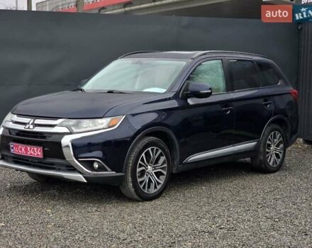 Синий Мицубиси Аутлендер, объемом двигателя 2.4 л и пробегом 134 тыс. км за 13999 $, фото 1 на Automoto.ua