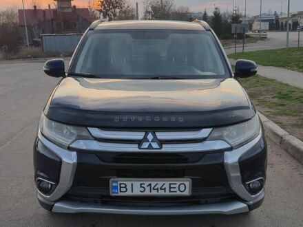 Синій Міцубісі Аутлендер, об'ємом двигуна 2.4 л та пробігом 160 тис. км за 15300 $, фото 1 на Automoto.ua