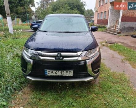 Синій Міцубісі Аутлендер, об'ємом двигуна 2.42 л та пробігом 135 тис. км за 17000 $, фото 1 на Automoto.ua