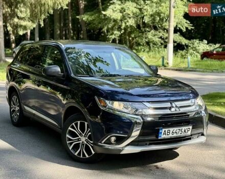 Синій Міцубісі Аутлендер, об'ємом двигуна 2.4 л та пробігом 102 тис. км за 15000 $, фото 1 на Automoto.ua
