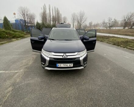 Синий Мицубиси Аутлендер, объемом двигателя 3 л и пробегом 120 тыс. км за 14500 $, фото 1 на Automoto.ua