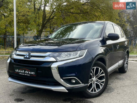 Синий Мицубиси Аутлендер, объемом двигателя 2.36 л и пробегом 135 тыс. км за 13899 $, фото 1 на Automoto.ua