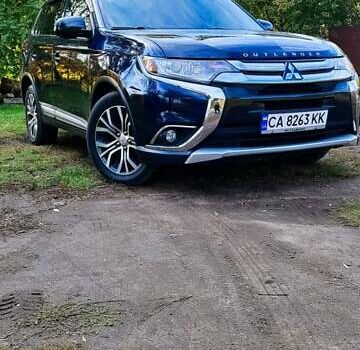 Синій Міцубісі Аутлендер, об'ємом двигуна 2.36 л та пробігом 146 тис. км за 18200 $, фото 1 на Automoto.ua