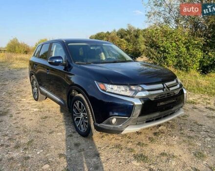 Синій Міцубісі Аутлендер, об'ємом двигуна 2.4 л та пробігом 221 тис. км за 12300 $, фото 1 на Automoto.ua