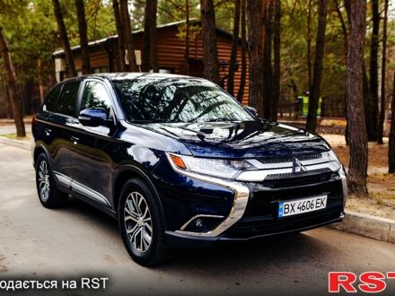 Синій Міцубісі Аутлендер, об'ємом двигуна 2.4 л та пробігом 197 тис. км за 13800 $, фото 1 на Automoto.ua