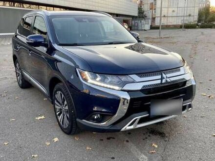Синій Міцубісі Аутлендер, об'ємом двигуна 2.4 л та пробігом 71 тис. км за 11800 $, фото 1 на Automoto.ua