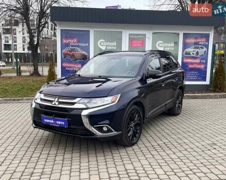 Синий Мицубиси Аутлендер, объемом двигателя 2.36 л и пробегом 73 тыс. км за 14900 $, фото 1 на Automoto.ua